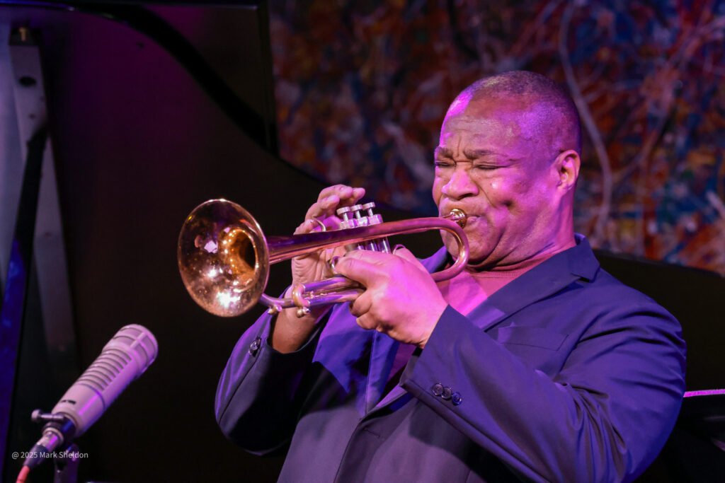 Closeup of Pharez Whitted playing the trumpet