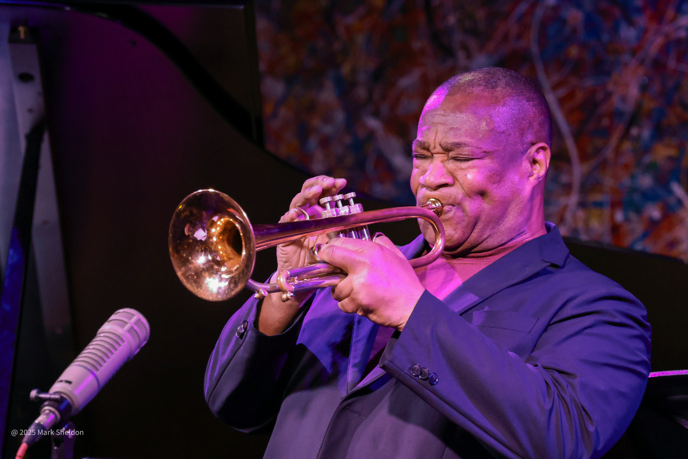Closeup of Pharez Whitted playing the trumpet